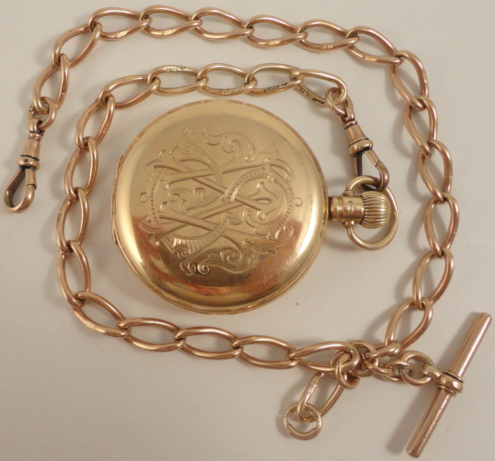 9ct rose gold half hunter pocket watch and 9ct albert watch chain Ian